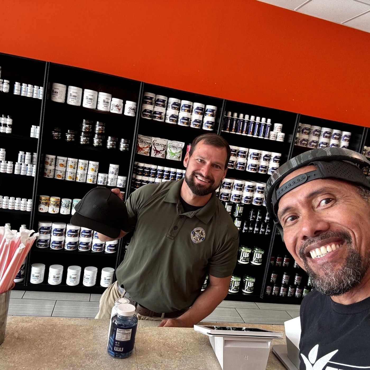 Coach L with a deputy customer at Xtreme Performance Nutrition